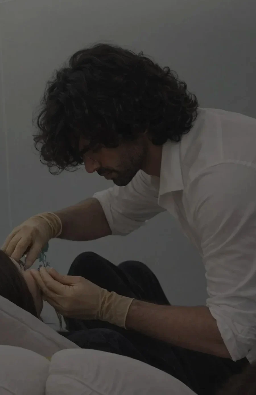 Dr Sultan assessing a patient at his clinic in Chelsea